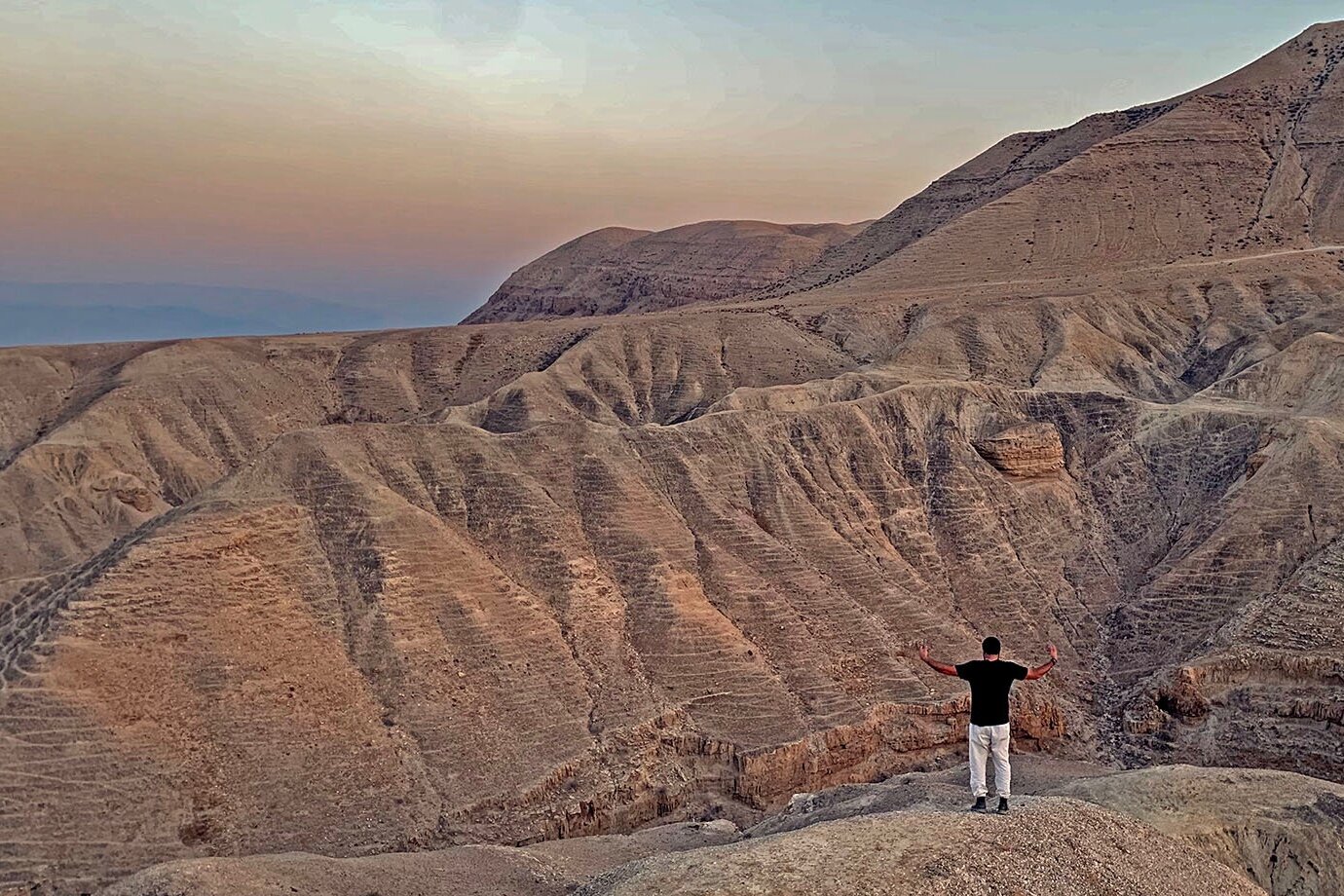 Sameer, a former Palestinian fighter, screams into a wadi when he feels angry or useless. PHOTO CREDIT: Shaina Shealy