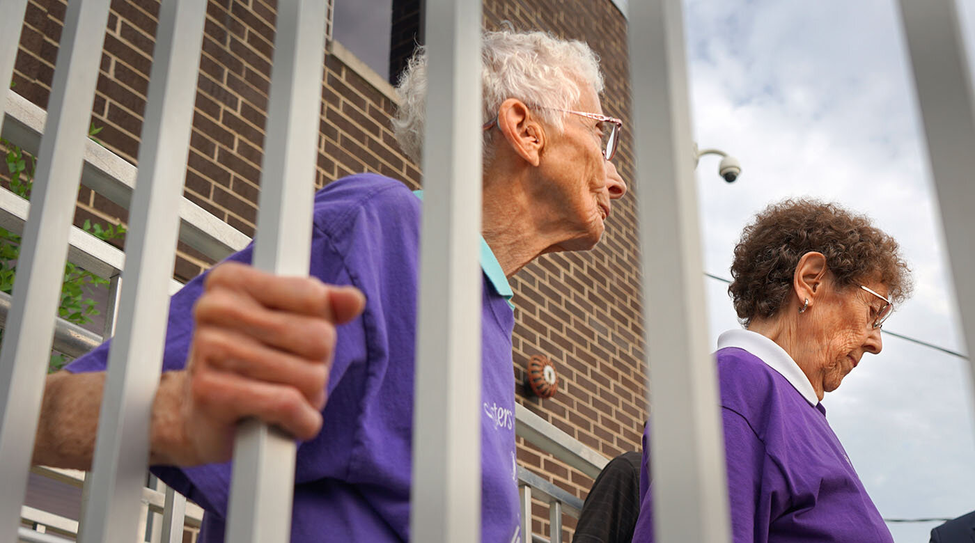 Sisters Joann Persch and Pat Murphy would board the buses weekly at the Broadview Processing Center to pray with detainees who were being deported from the US. Photo Credit: Heidi Shin