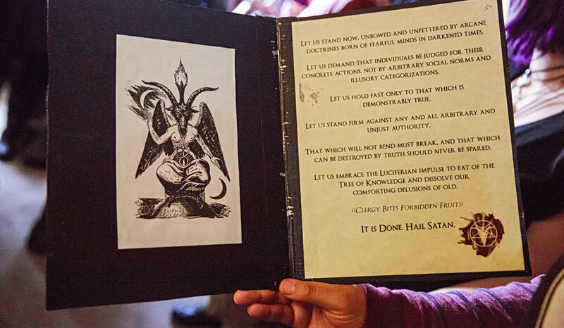 The Satanic Invocation read by members of The Satanic Temple of Seattle at the close of meetings. Photo Credit: Erika Schultz