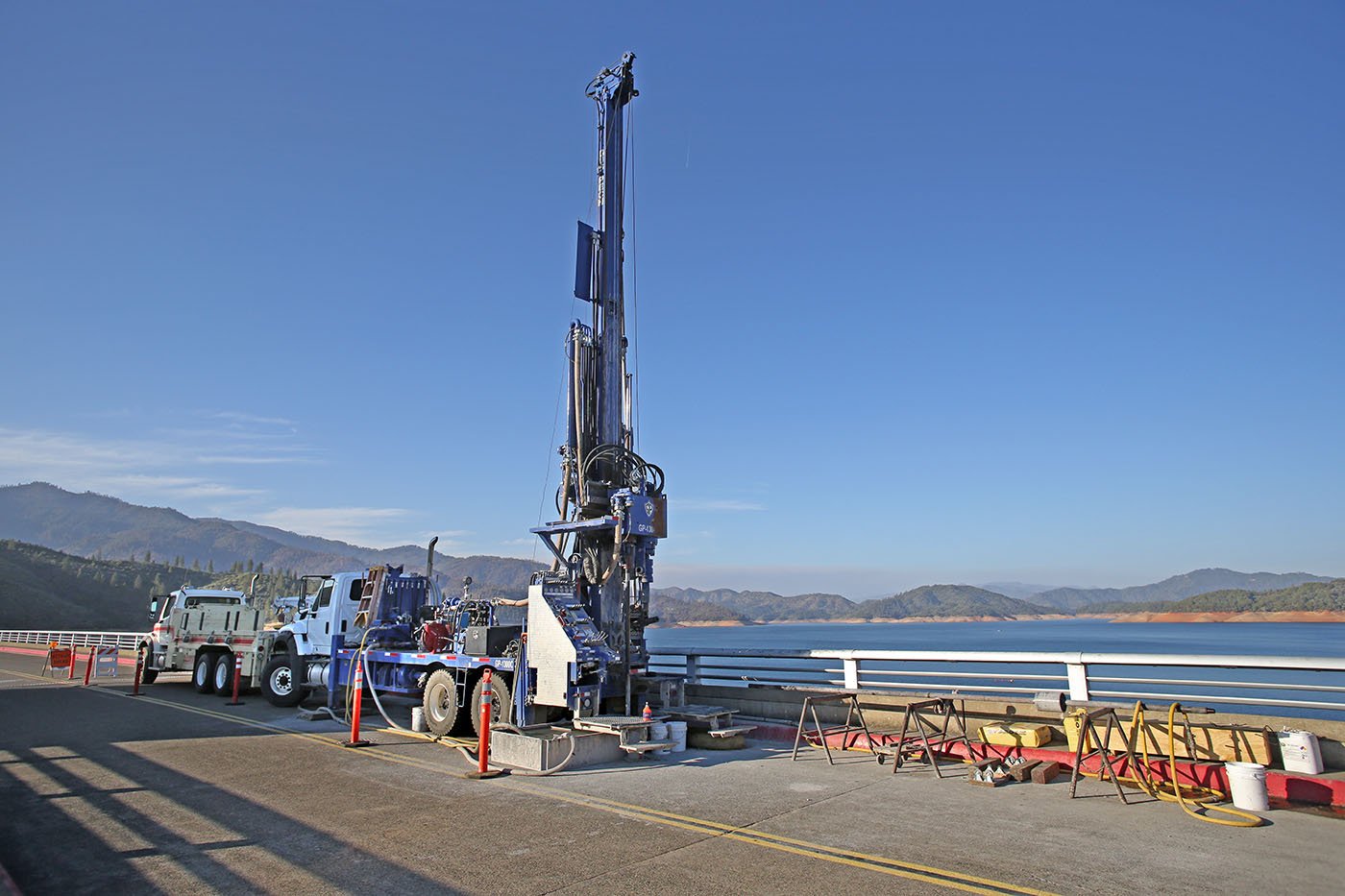 Shasta Lake, CA — To help determine if Shasta Dam could bear the weight of another 18 and a half feet of concrete, crews drilled into the dam to collect concrete samples. September 28, 2018. Tom Levy/The Spiritual Edge