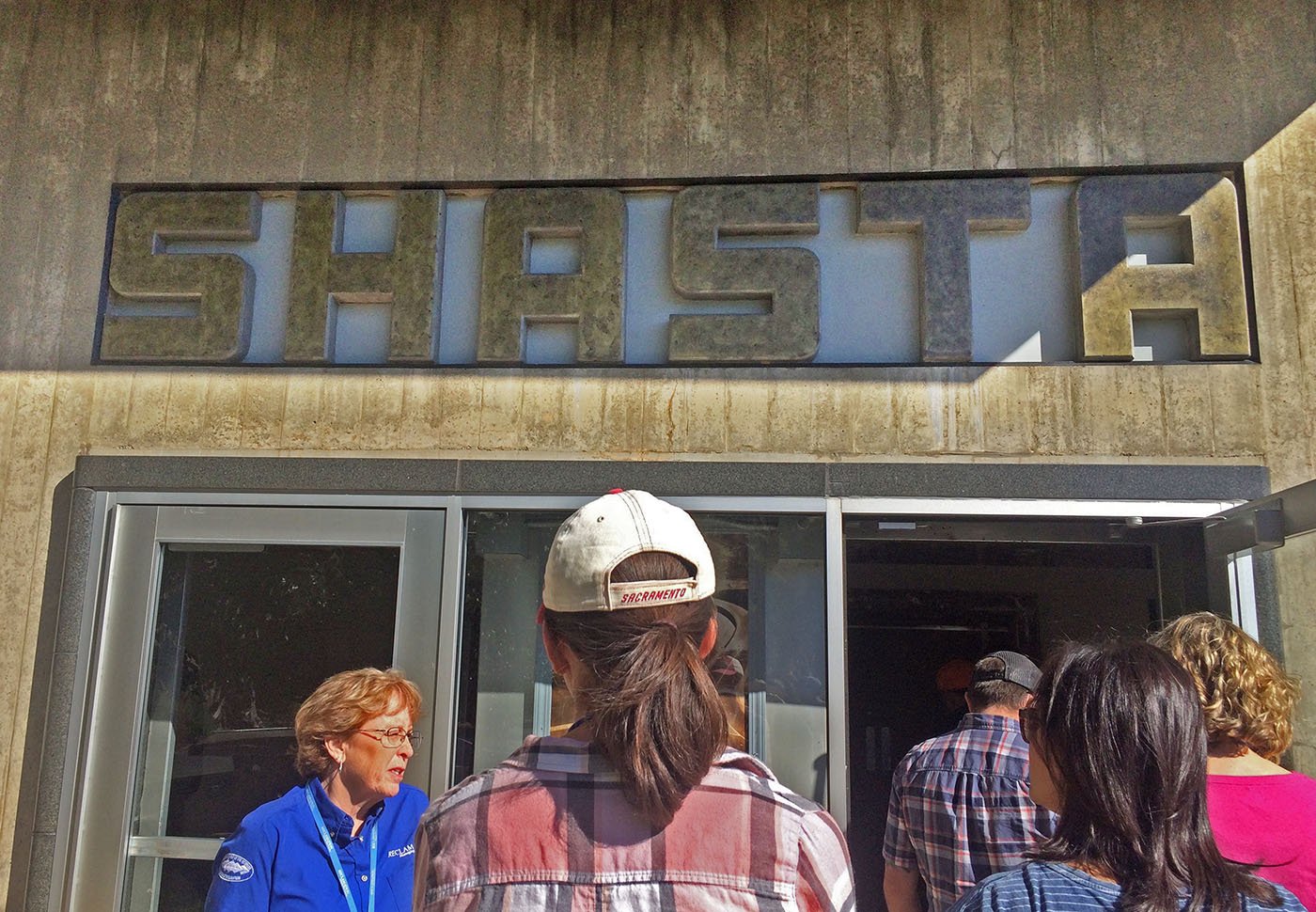 Shasta Lake, CA — Participants of a three-day Northern California water tour enter the Shasta Dam power plant. October 11, 2018. Judy Silber/The Spiritual Edge